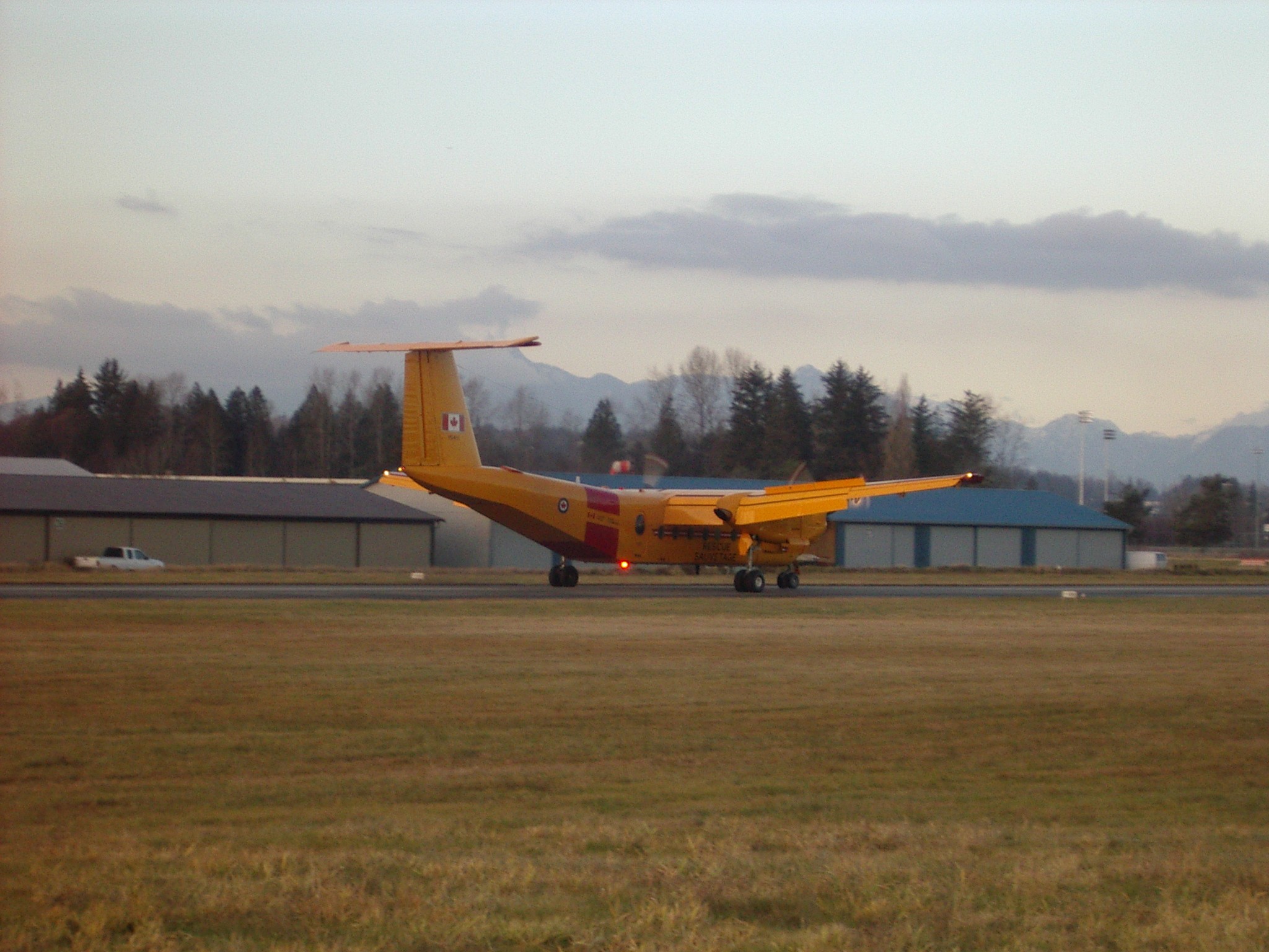 Canadian Armed Forces Buffalo lands and Langley Airport.  Langley Flying School.